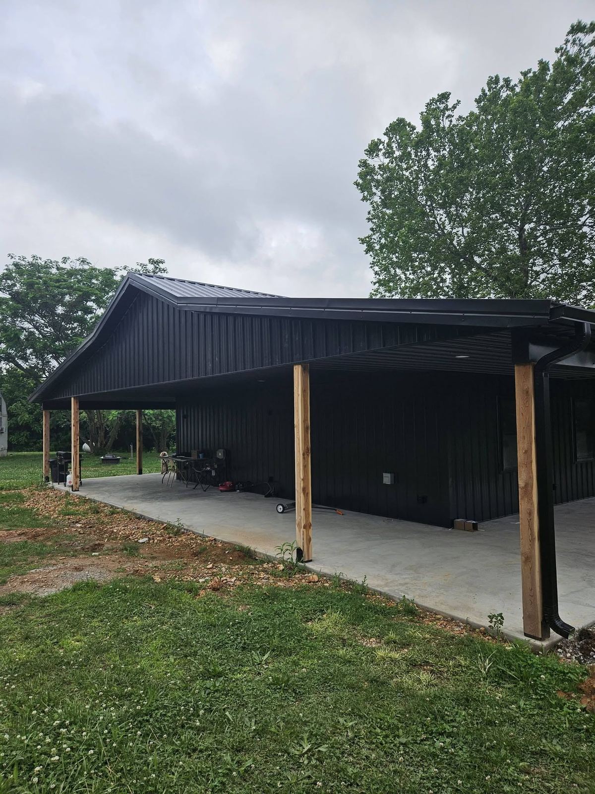 Covered porch overhang showing finished soffit, gutter and fascia detail